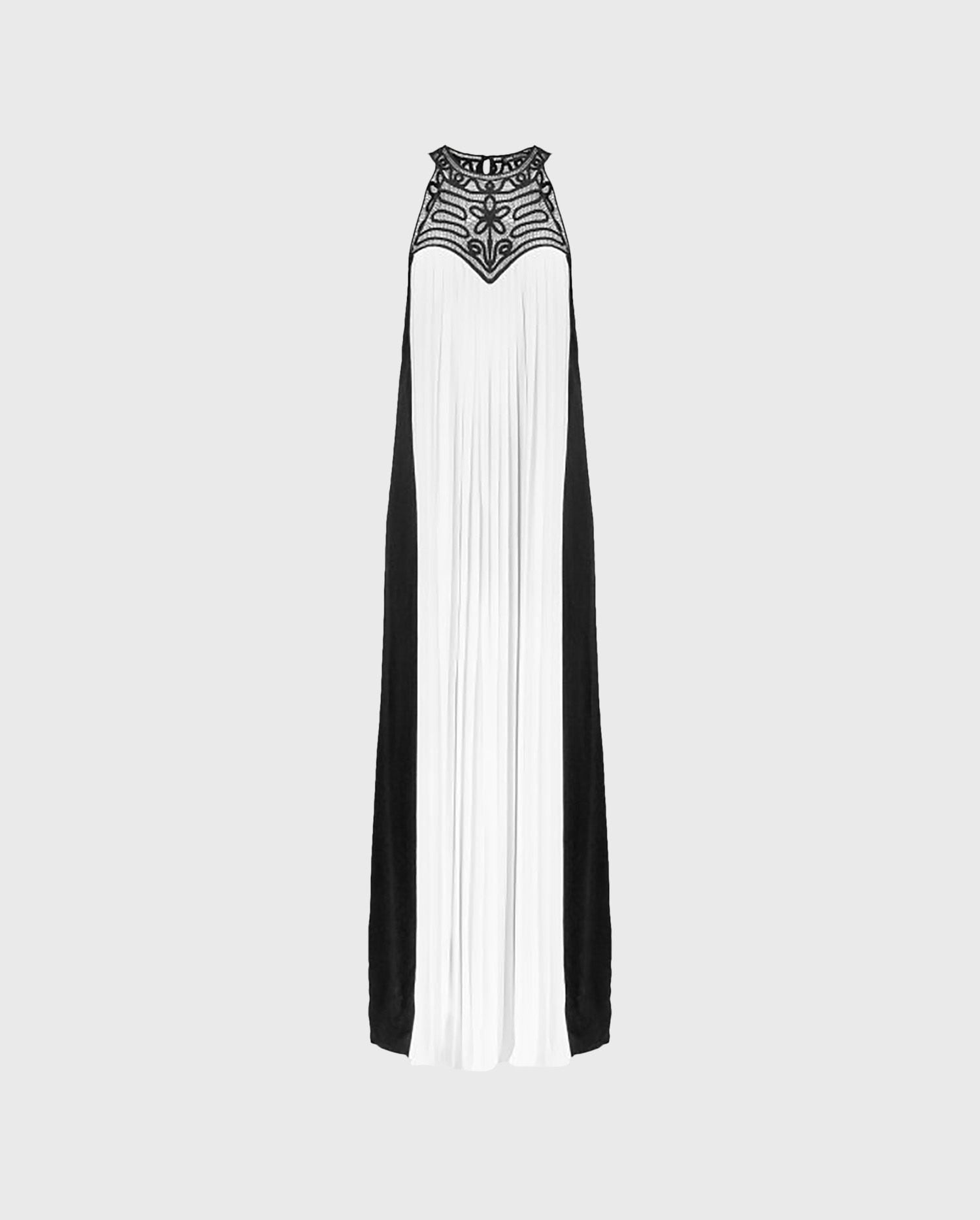 The VOLUPTA white and black maxi dress is the perfect look for making an entrance for your next event.